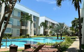 Apt hotel praia Guarajuba condominio Porto Smeralda praia excluisiva